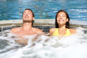 Spa,Couple,Relaxing,Enjoying,Jacuzzi,Hot,Tub,Bubble,Bath,Outdoors